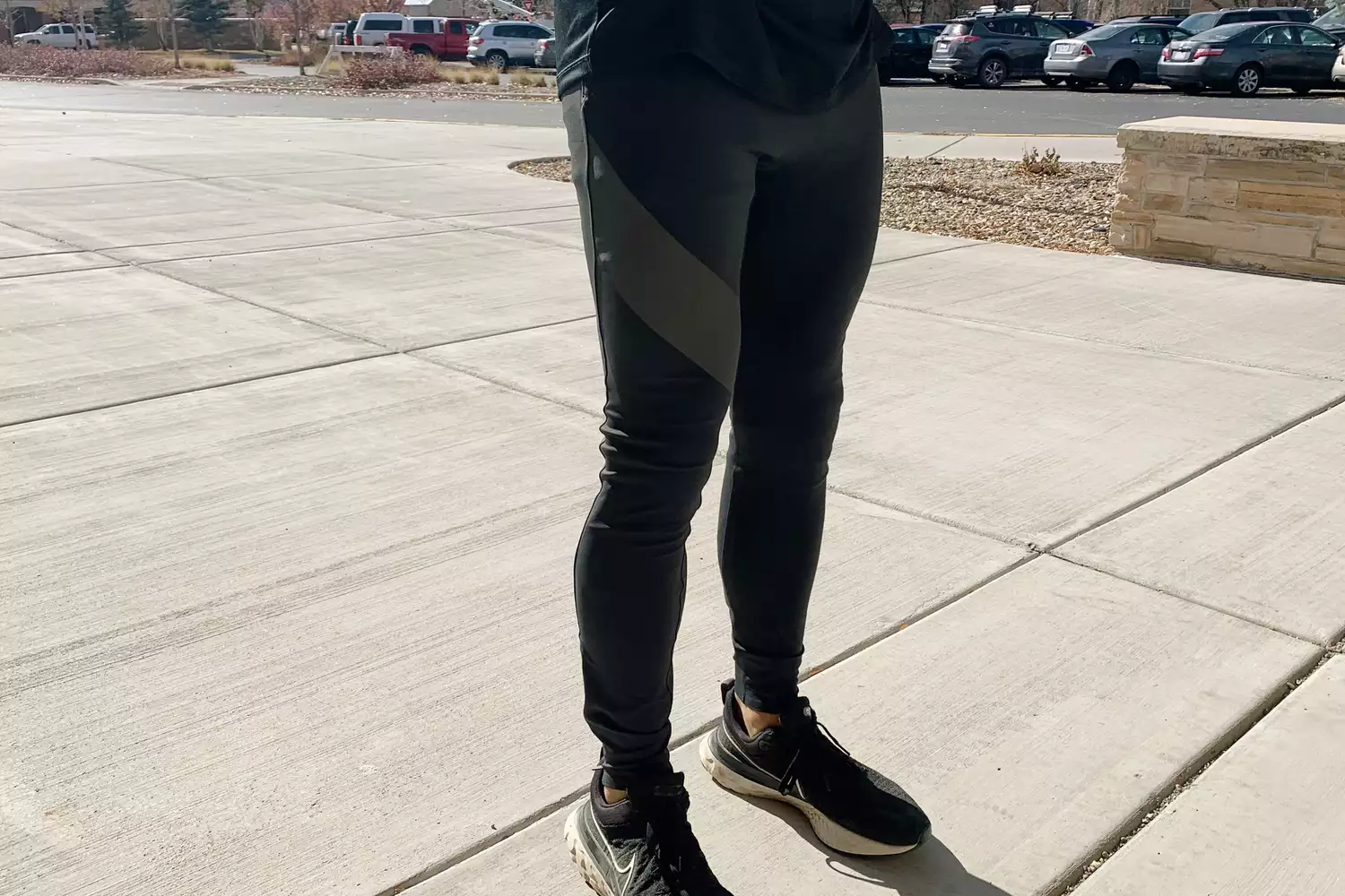 Person standing outside while wearing Tracksmith Menâs NDO Tights