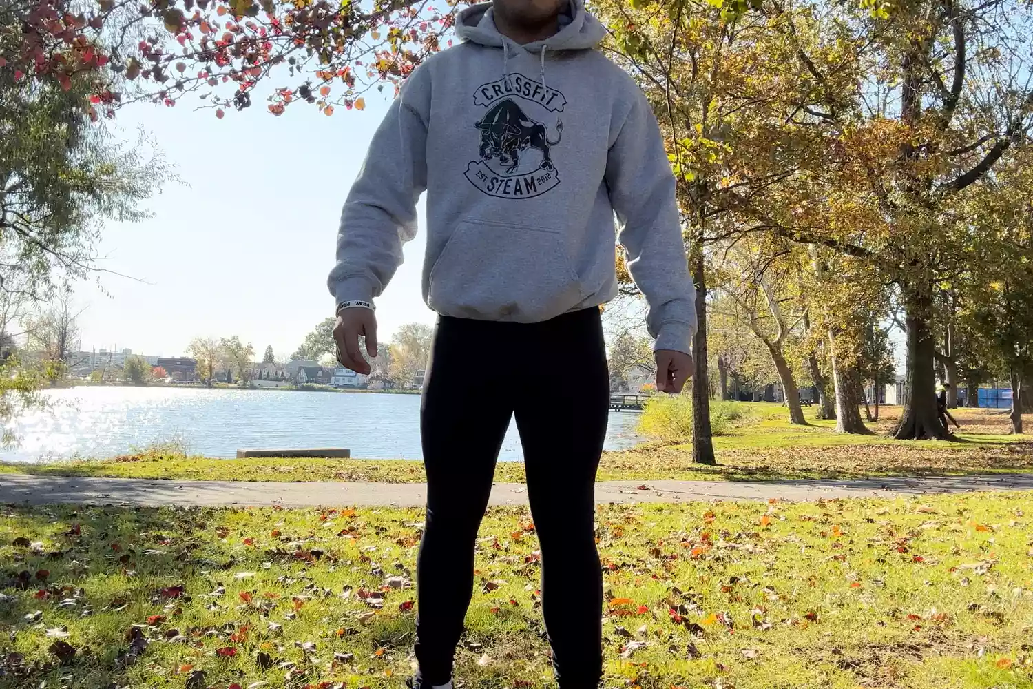 Person standing outside wearing Vuori Men's Limitless Compression Tight