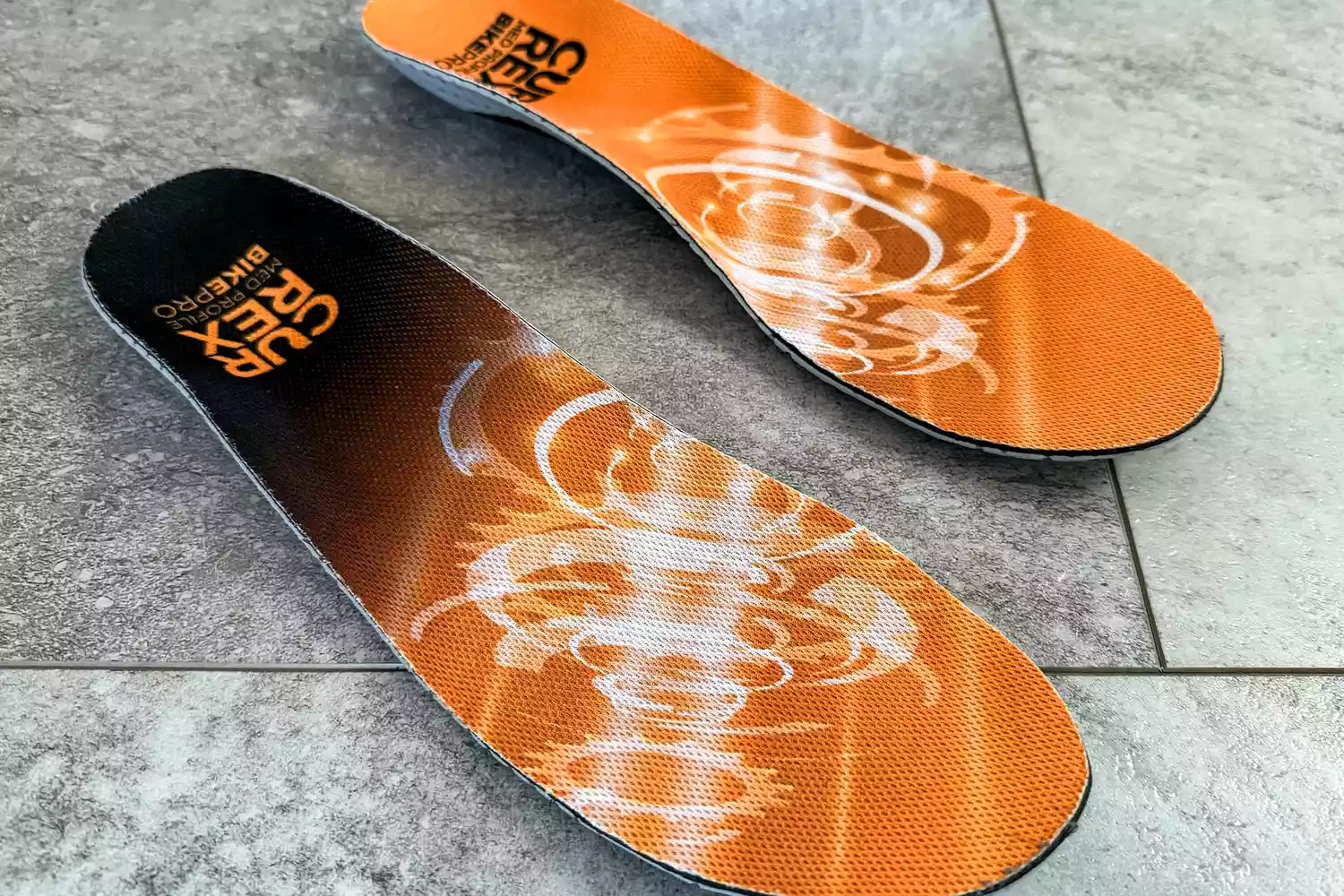 The CURREX BIKEPRO Insoles on a tile floor