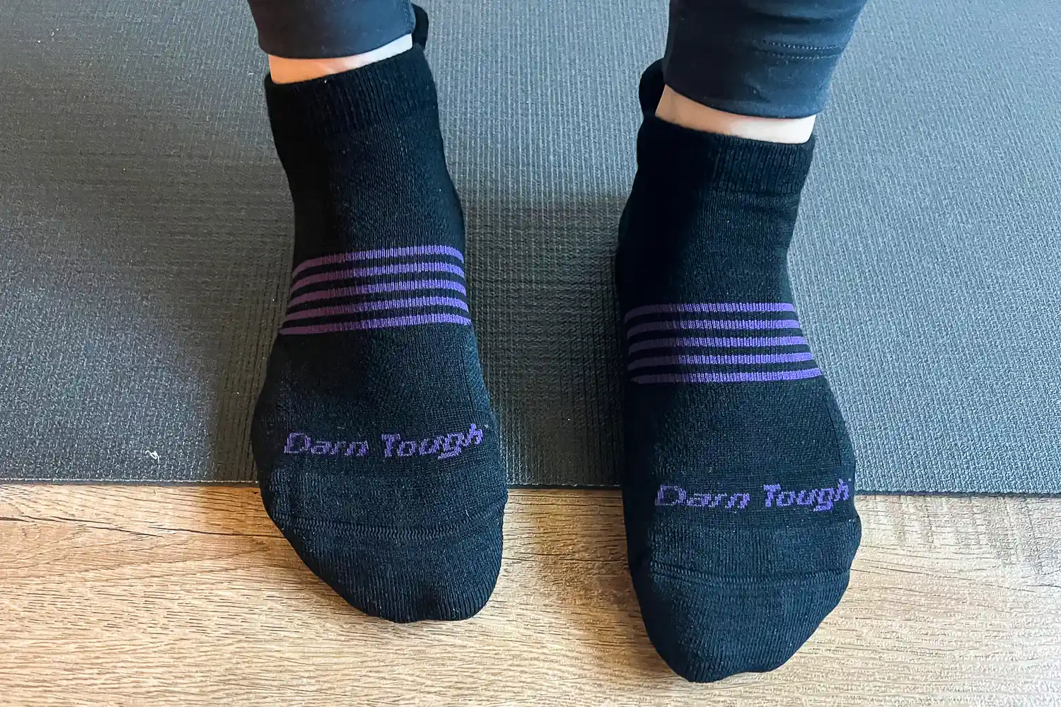 An overhead view of a person wearing a pair of Darn Tough Men's and Women's Element No Show 2-Pack Socks