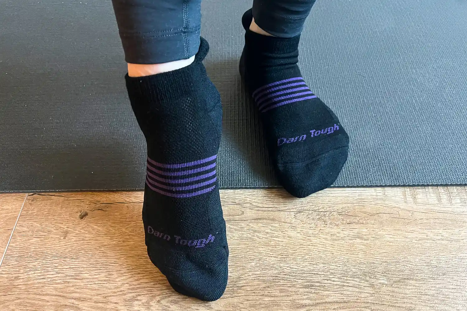 A person wears the Darn Tough Men's and Women's Element No Show 2-Pack Socks