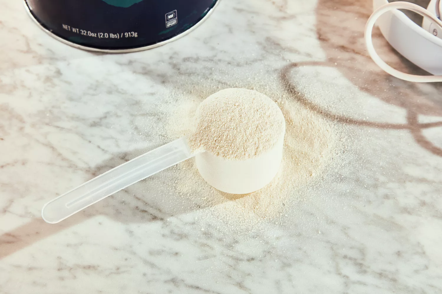 Closeup of a scoop of Gnarly Grass-Fed Whey Vanilla Protein Supplement