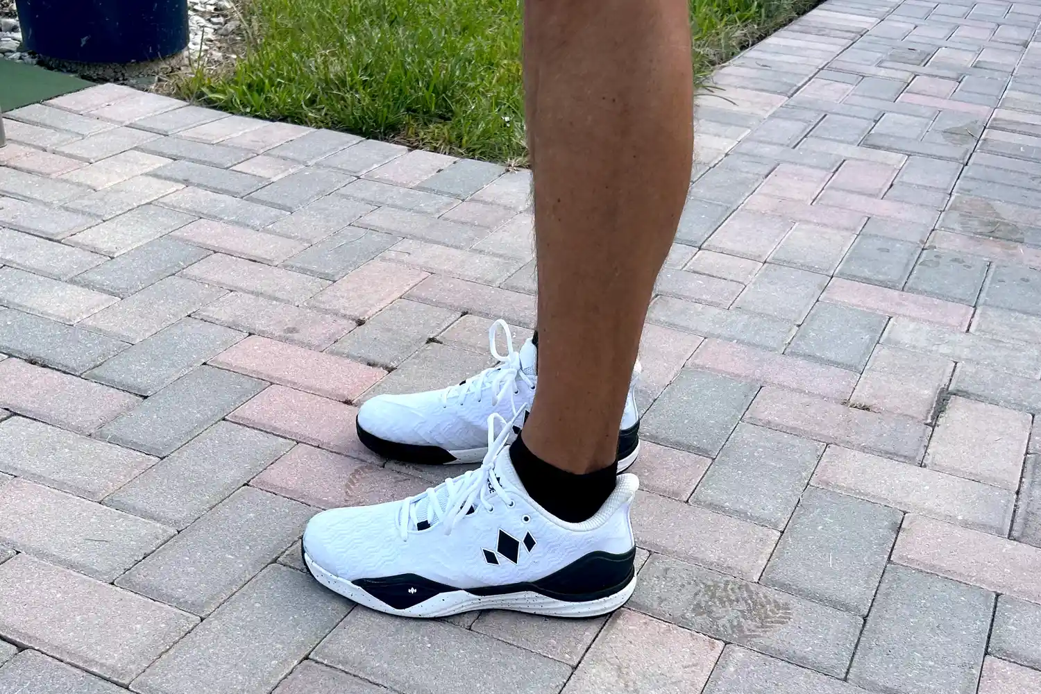A side view of a person wearing the Diadem Court Burst Pickleball Shoes