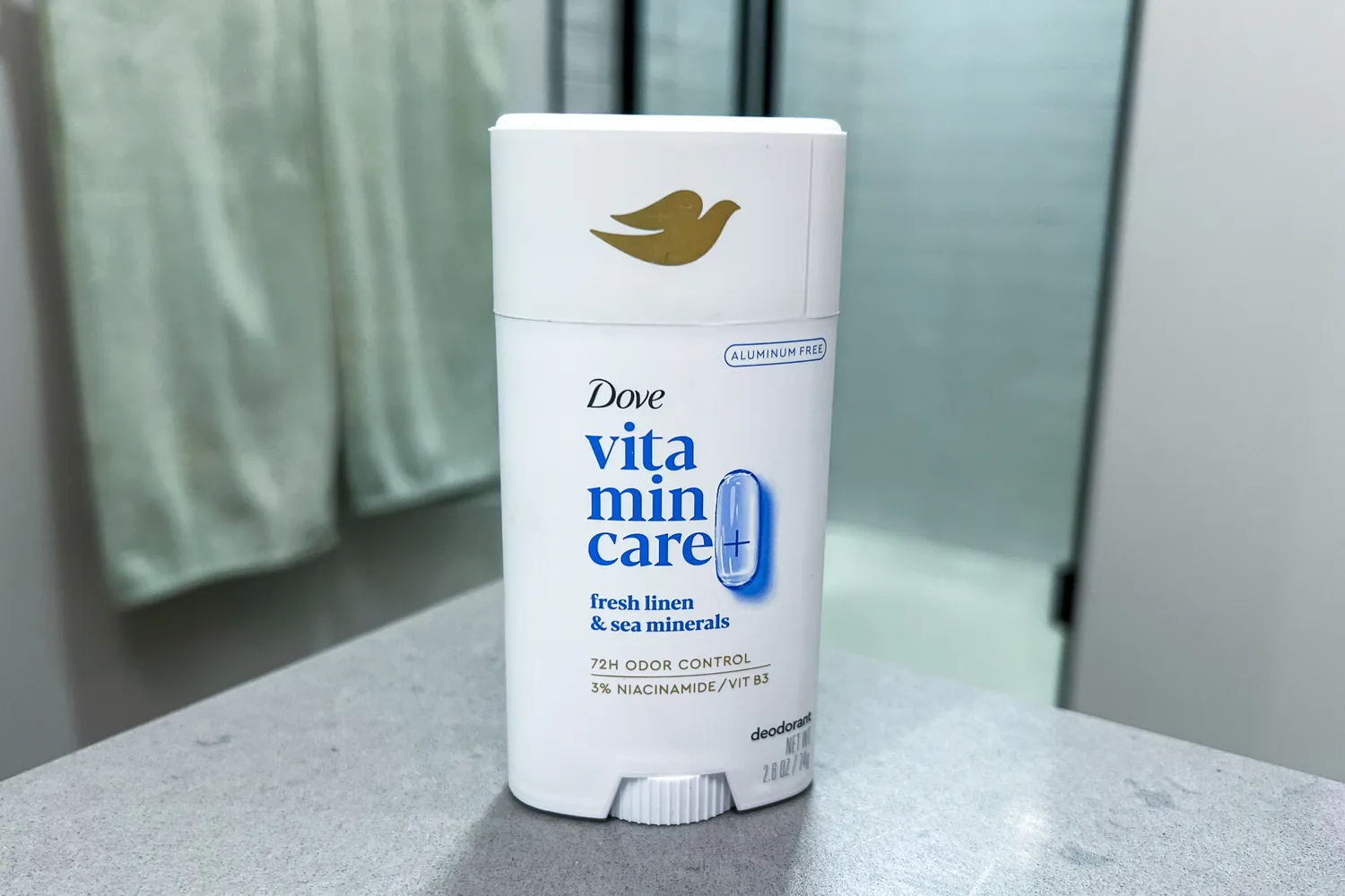 The Dove VitaminCare+ Deodorant Stick on a bathroom countertop
