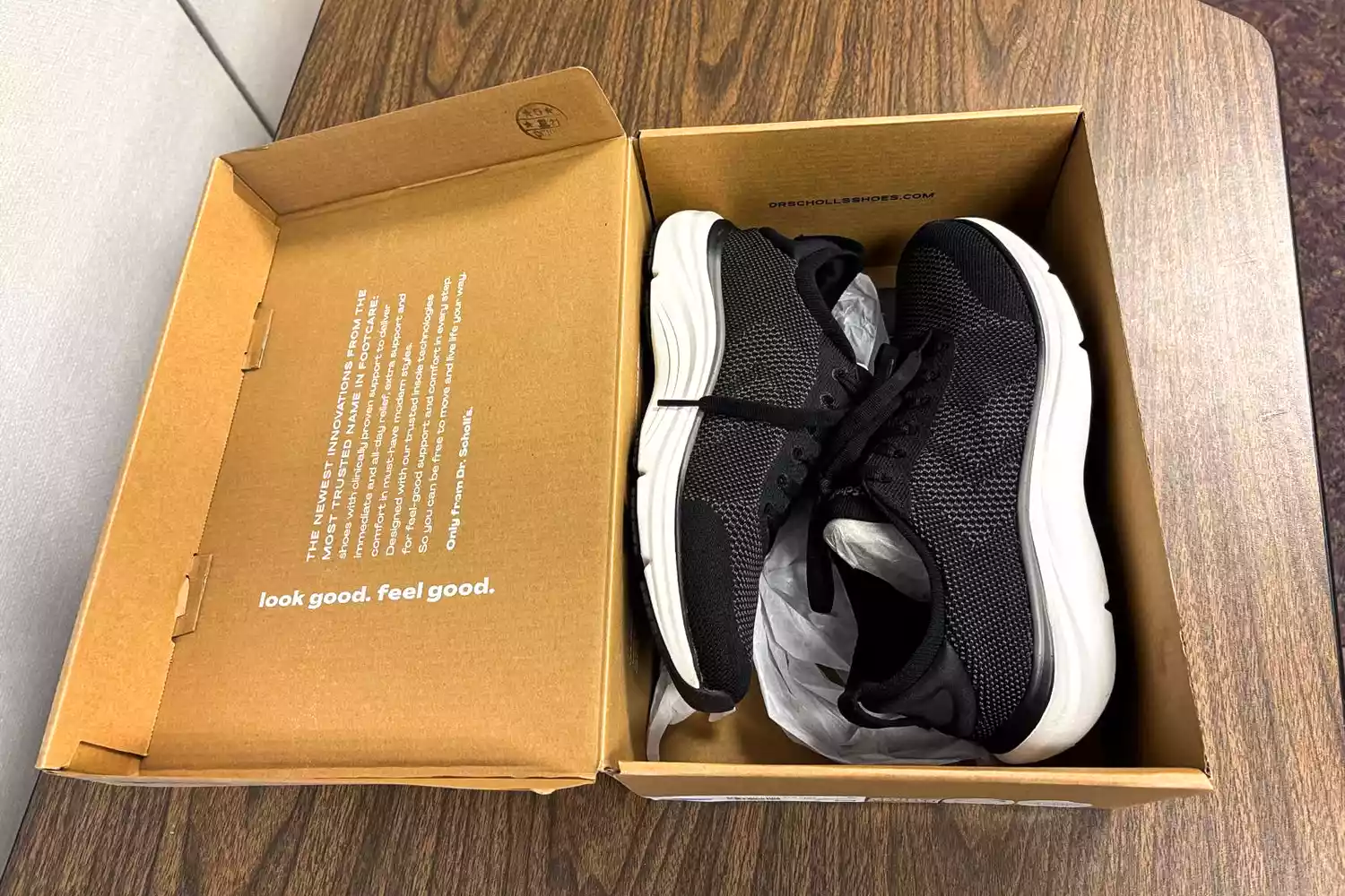 The Dr. Scholl's Women's Feel Support Lace Up Sneakers in a box