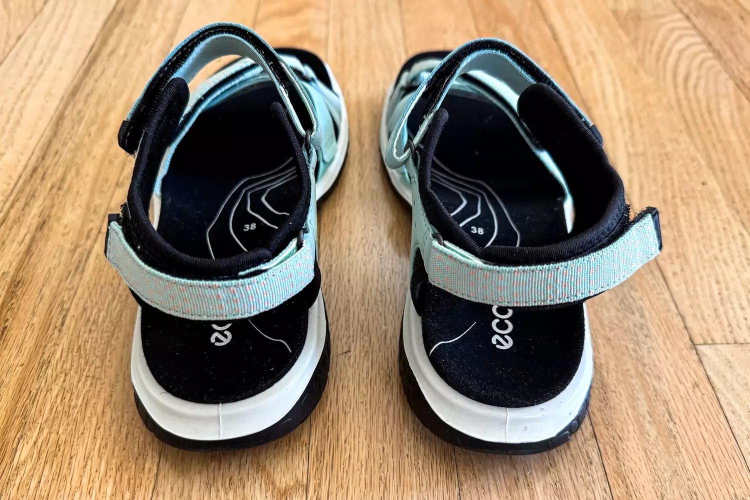 The back of the ECCO Offroad Roam Women's Nubuck Outdoor Sandals on wood