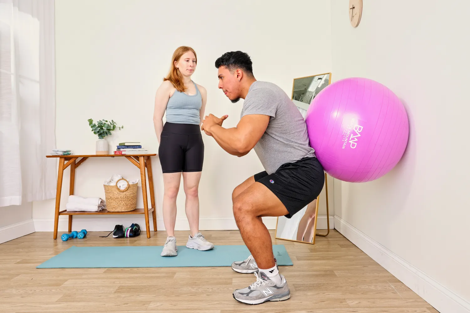 A person exercises using the Black Mountain Professional Grade Stability Ball