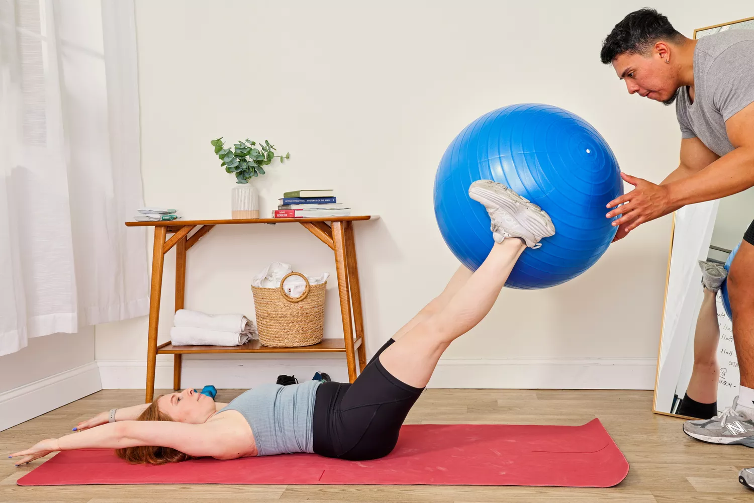 A person exercises using the GalSports Anti-Sport Yoga Ball