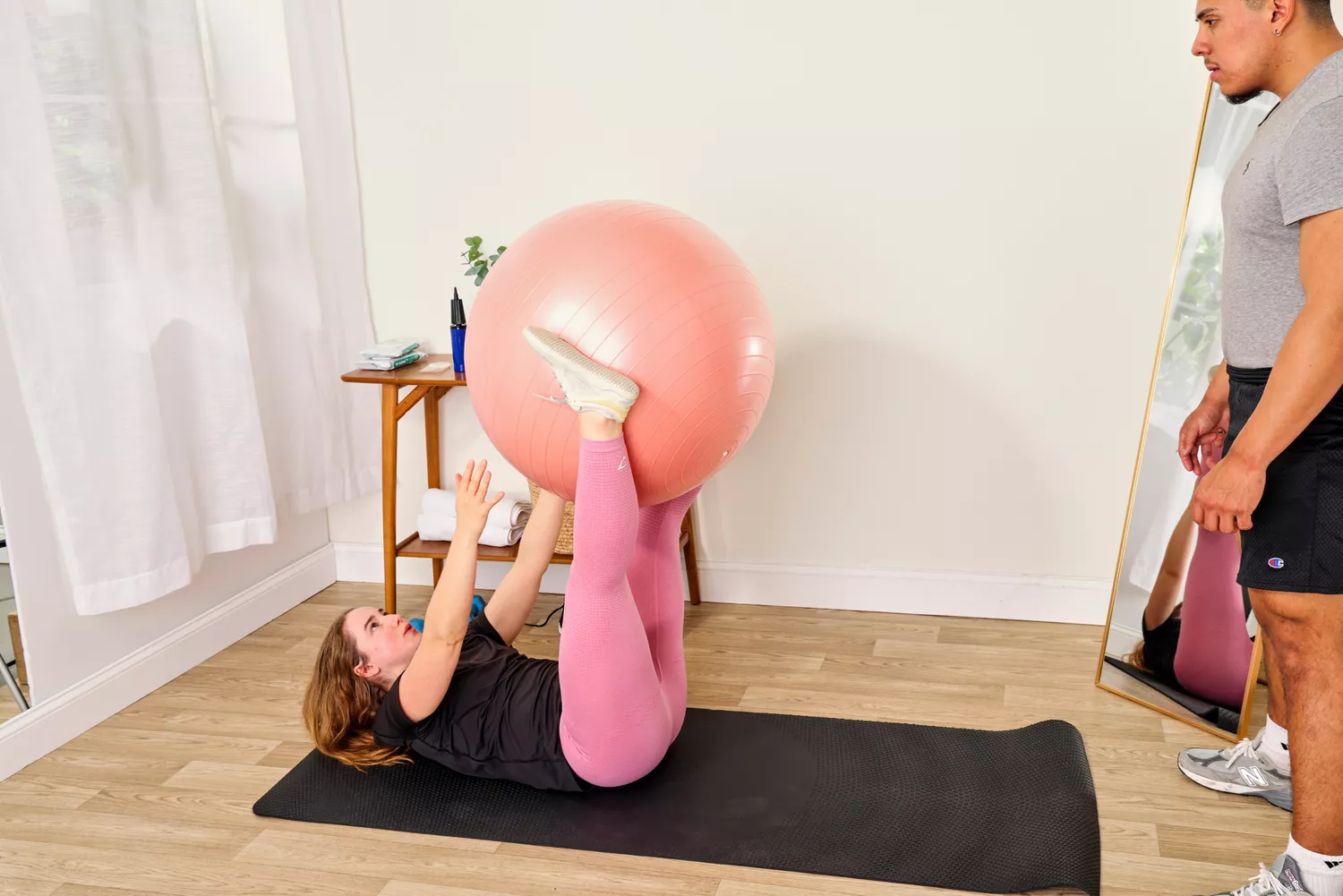 A person exercises using the Retrospec Luna Exercise Ball