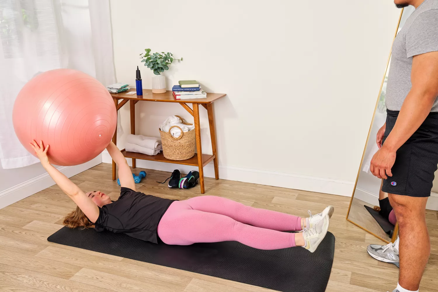 A person exercises using the Retrospec Luna Exercise Ball