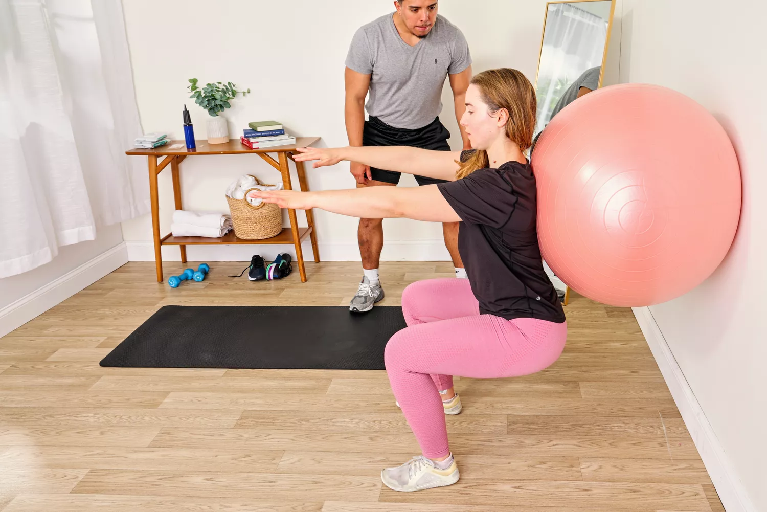 A person exercises using the Retrospec Luna Exercise Ball