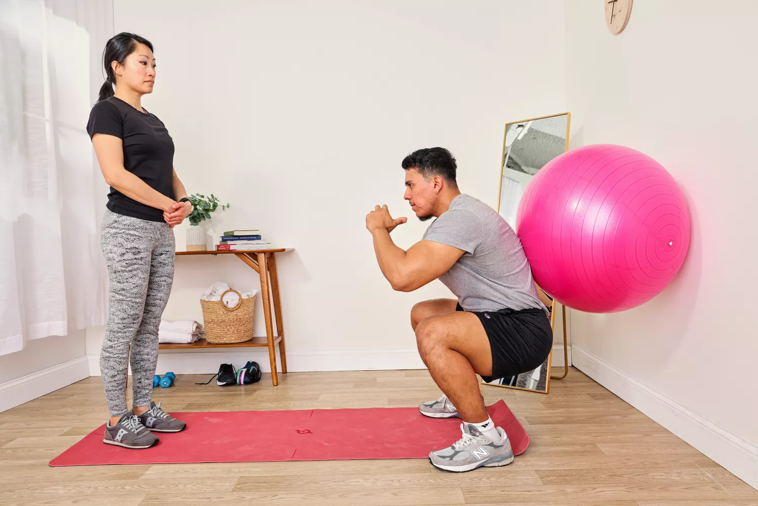 A person exercises using the SmarterLife Workout Exercise Ball