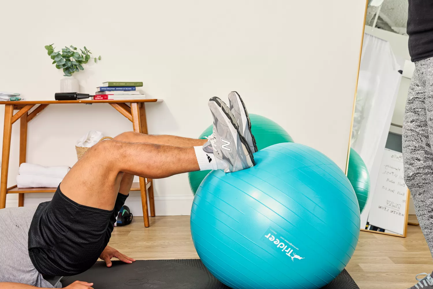 A person exercises using the Trideer Exercise Ball Chair