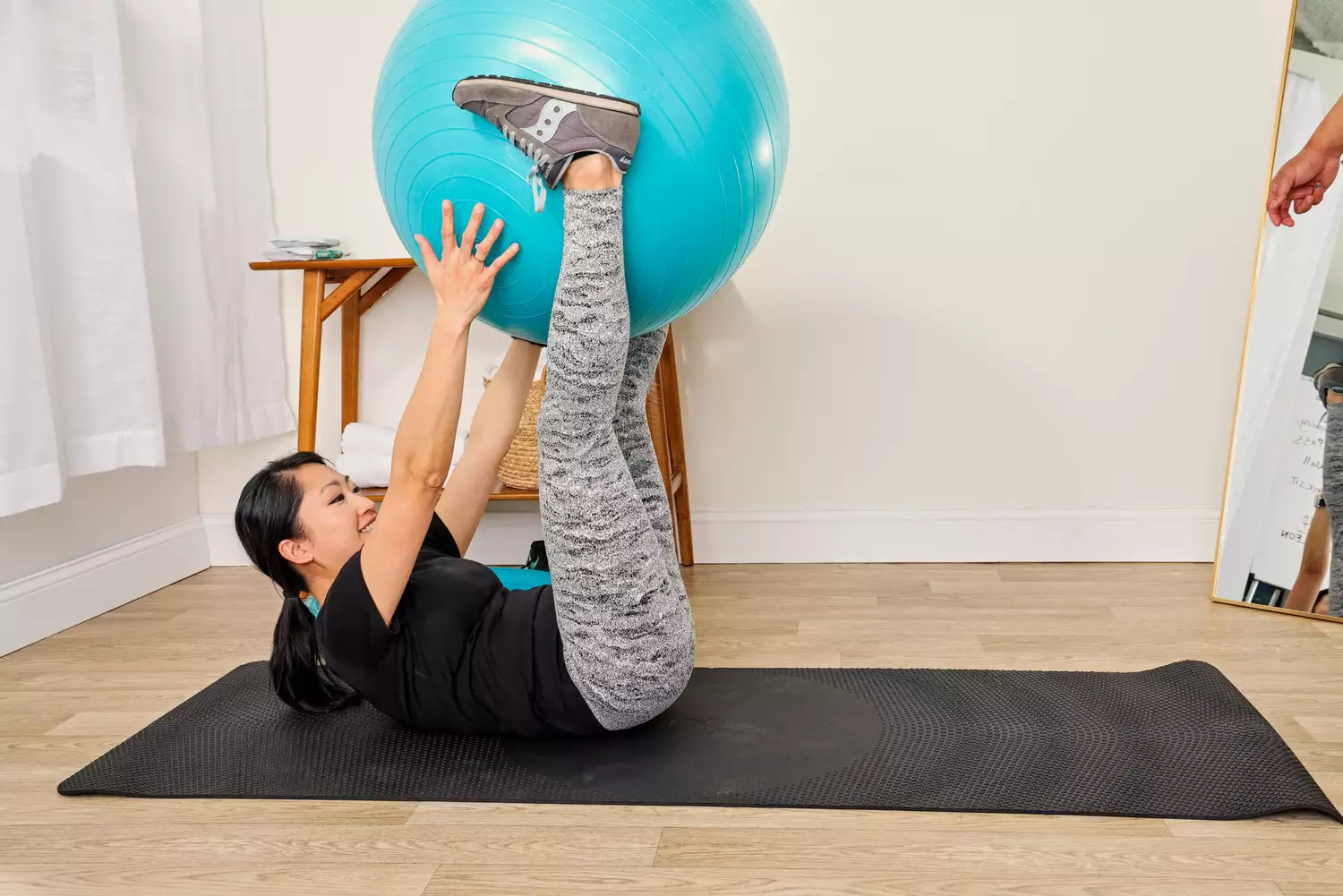 A person exercises using the Trideer Exercise Ball Chair