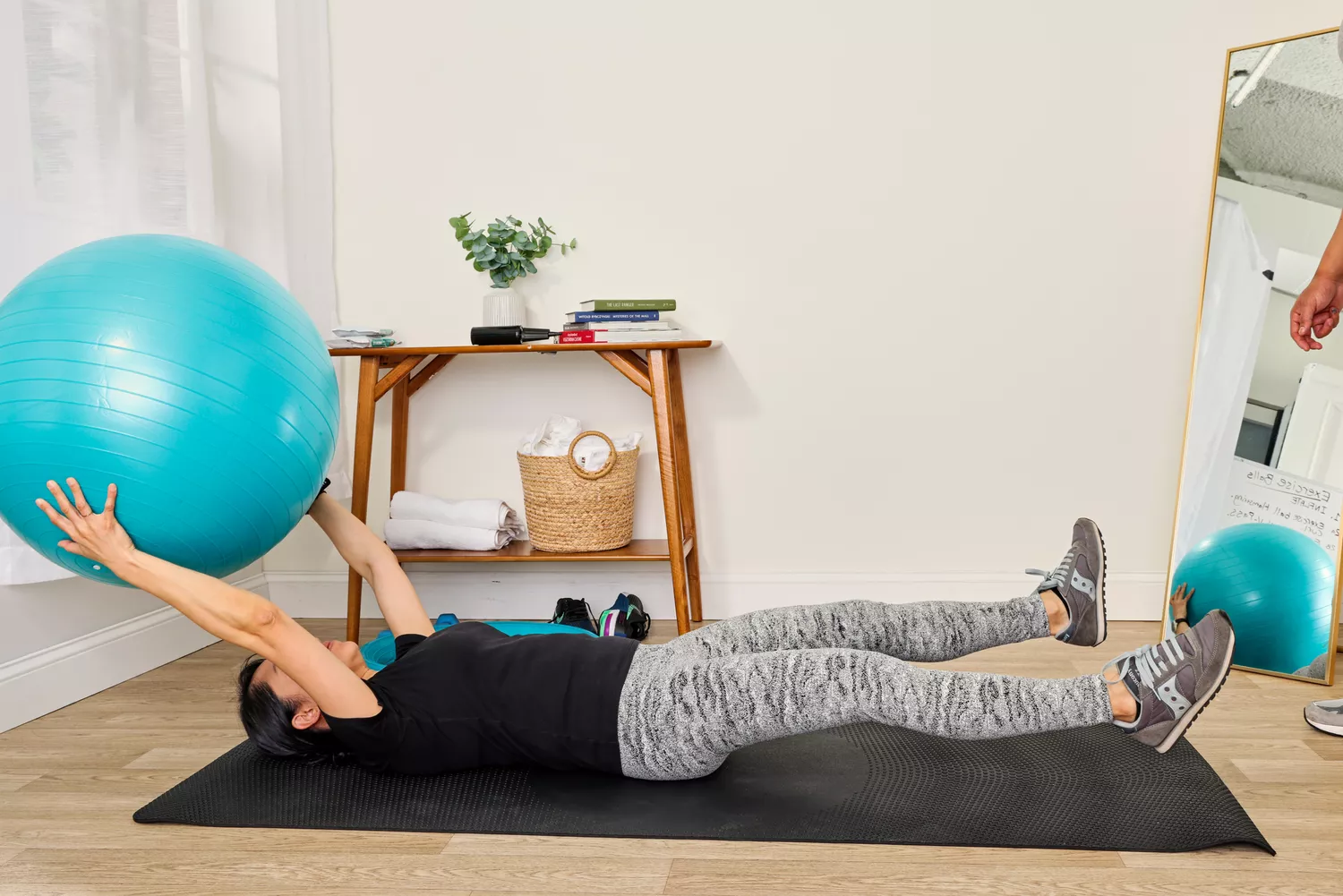 A person exercises using the Trideer Exercise Ball Chair