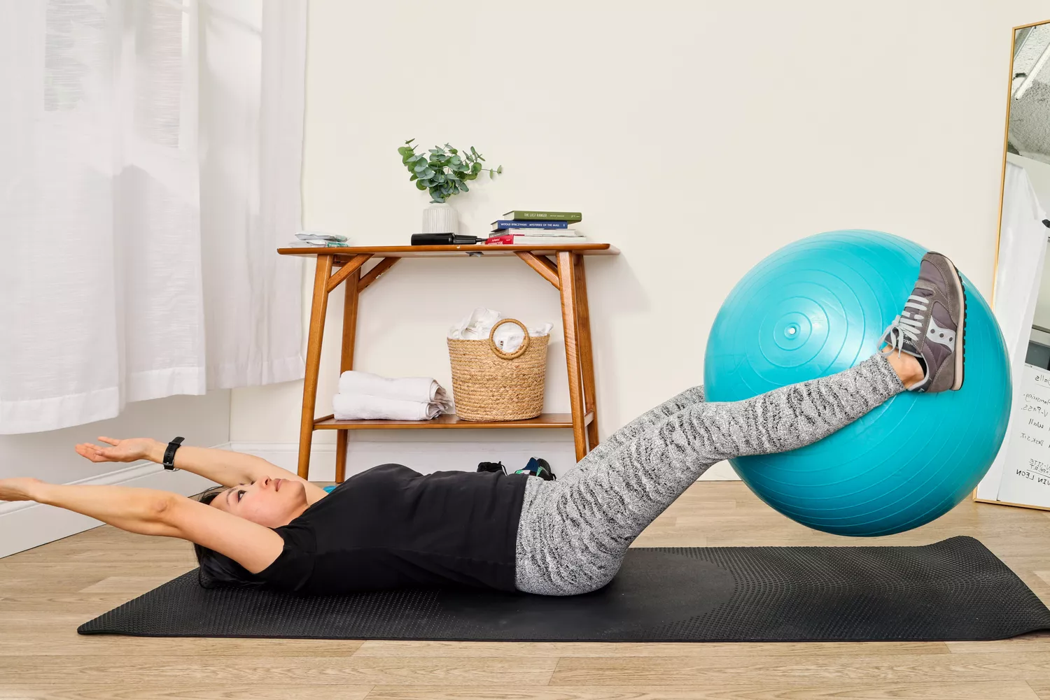 A person exercises using the Trideer Exercise Ball Chair