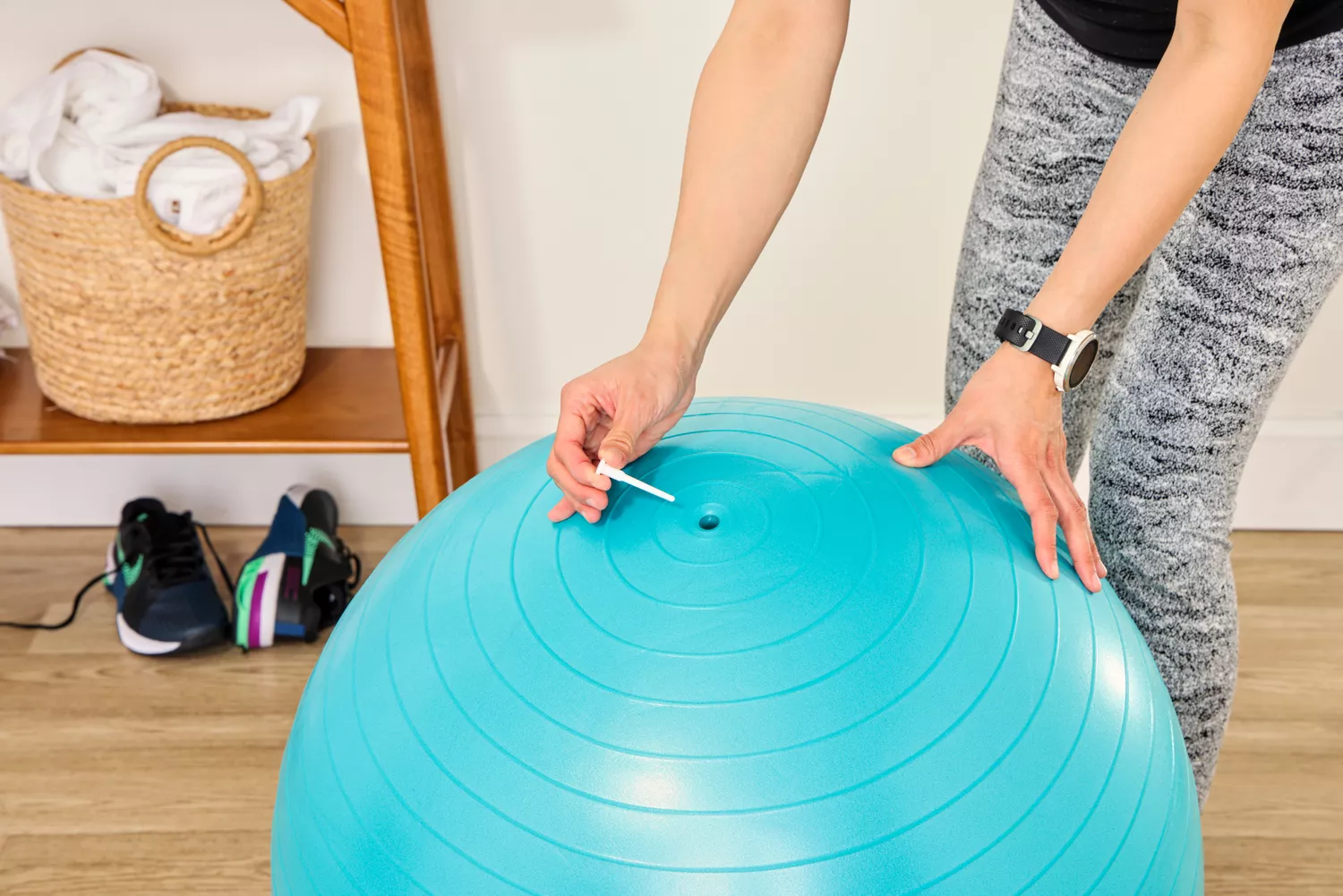 A person plugs the Trideer Exercise Ball Chair