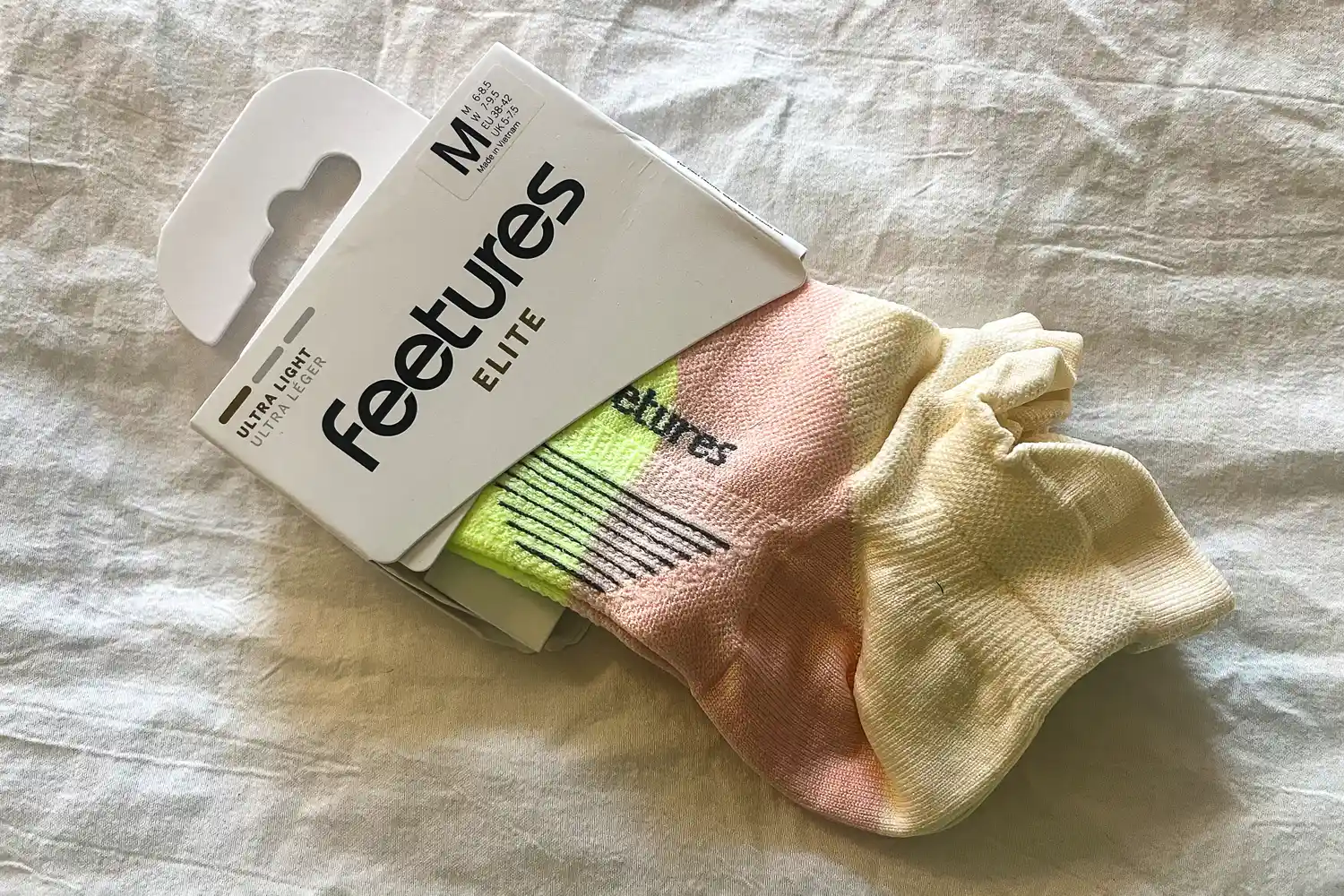 The Feetures Elite Ultra Light Tab Socks in packaging