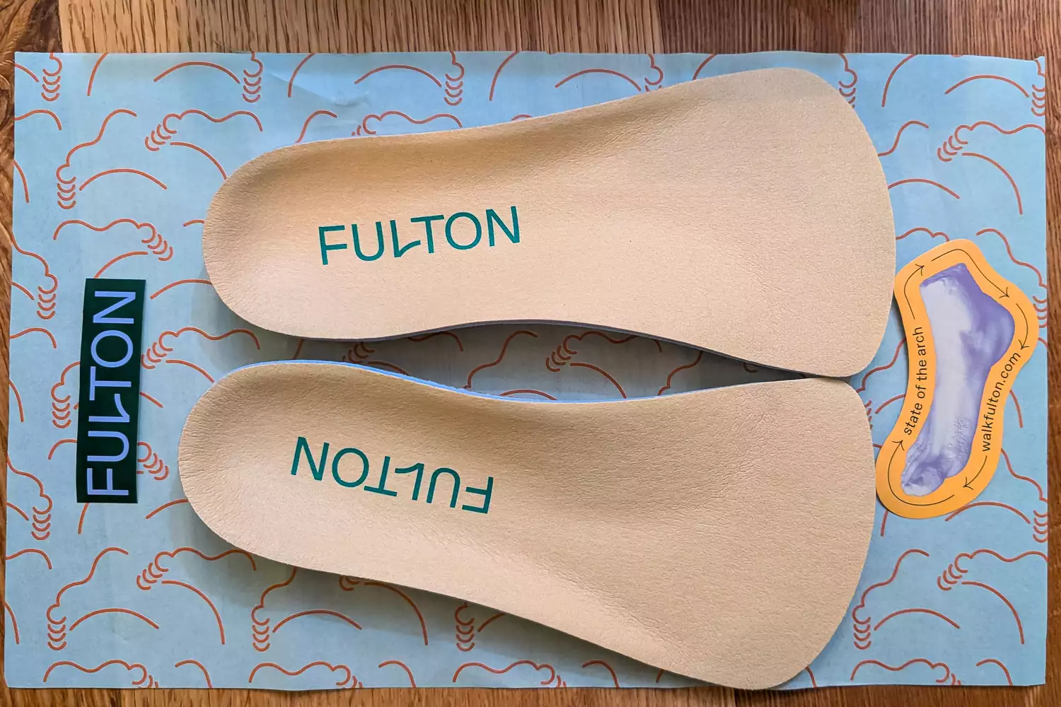 An overhead view of the Fulton The Universal Insoles on the box