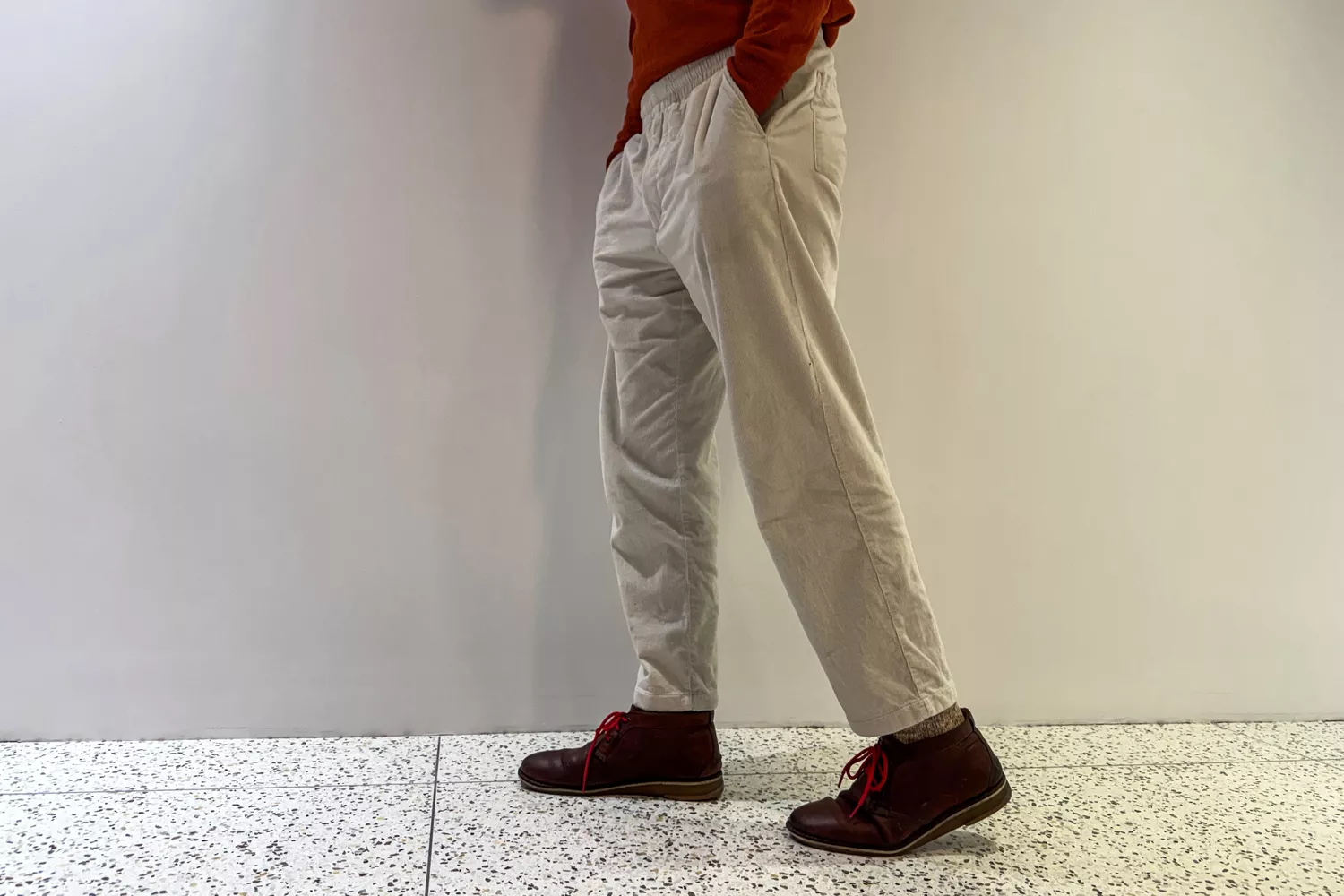 A person walks on tile while wearing the Fulton The Universal Insoles