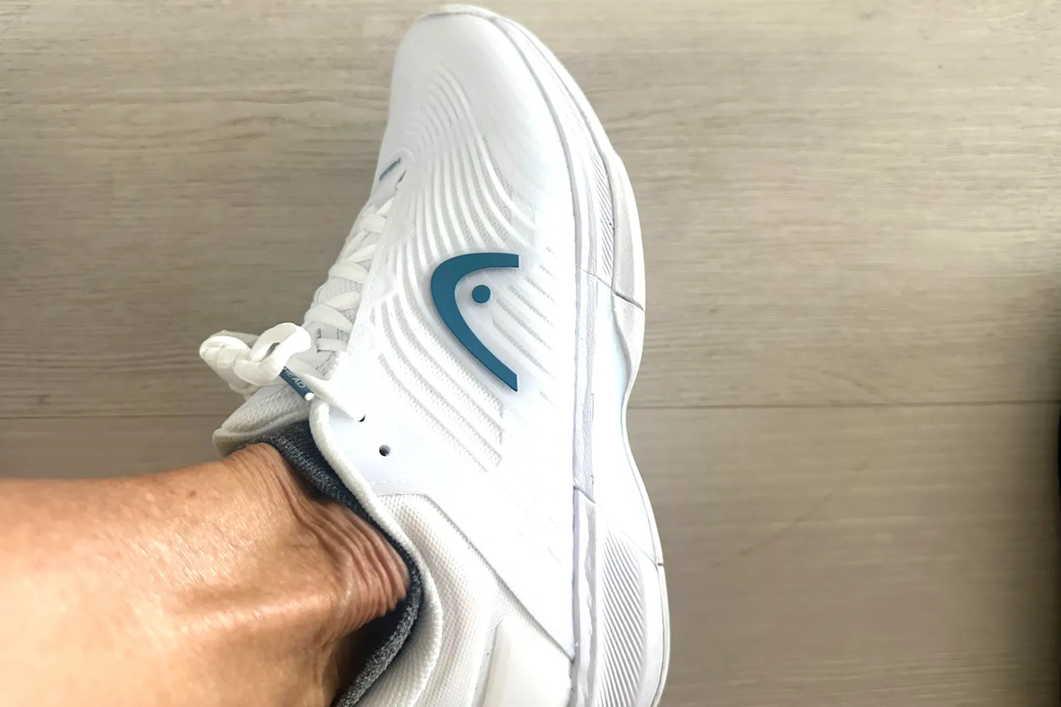 The brand logo on the side of the HEAD Women's Revolt Pro 4.5 Pickleball Shoe