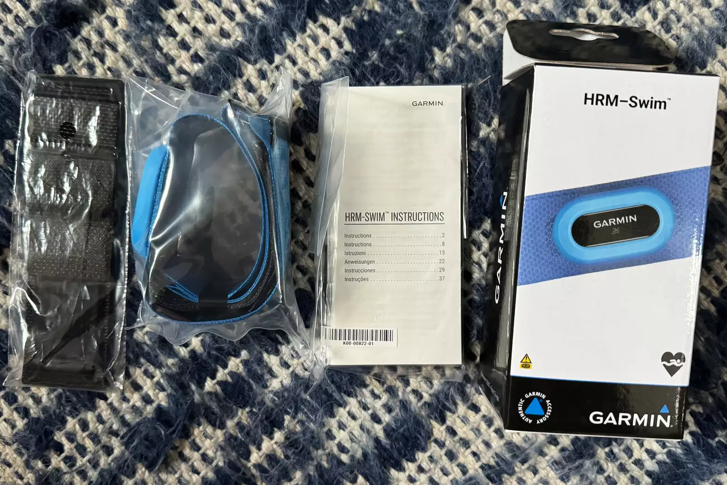 All of the parts to a Garmin HRM-Swim heart rate monitor