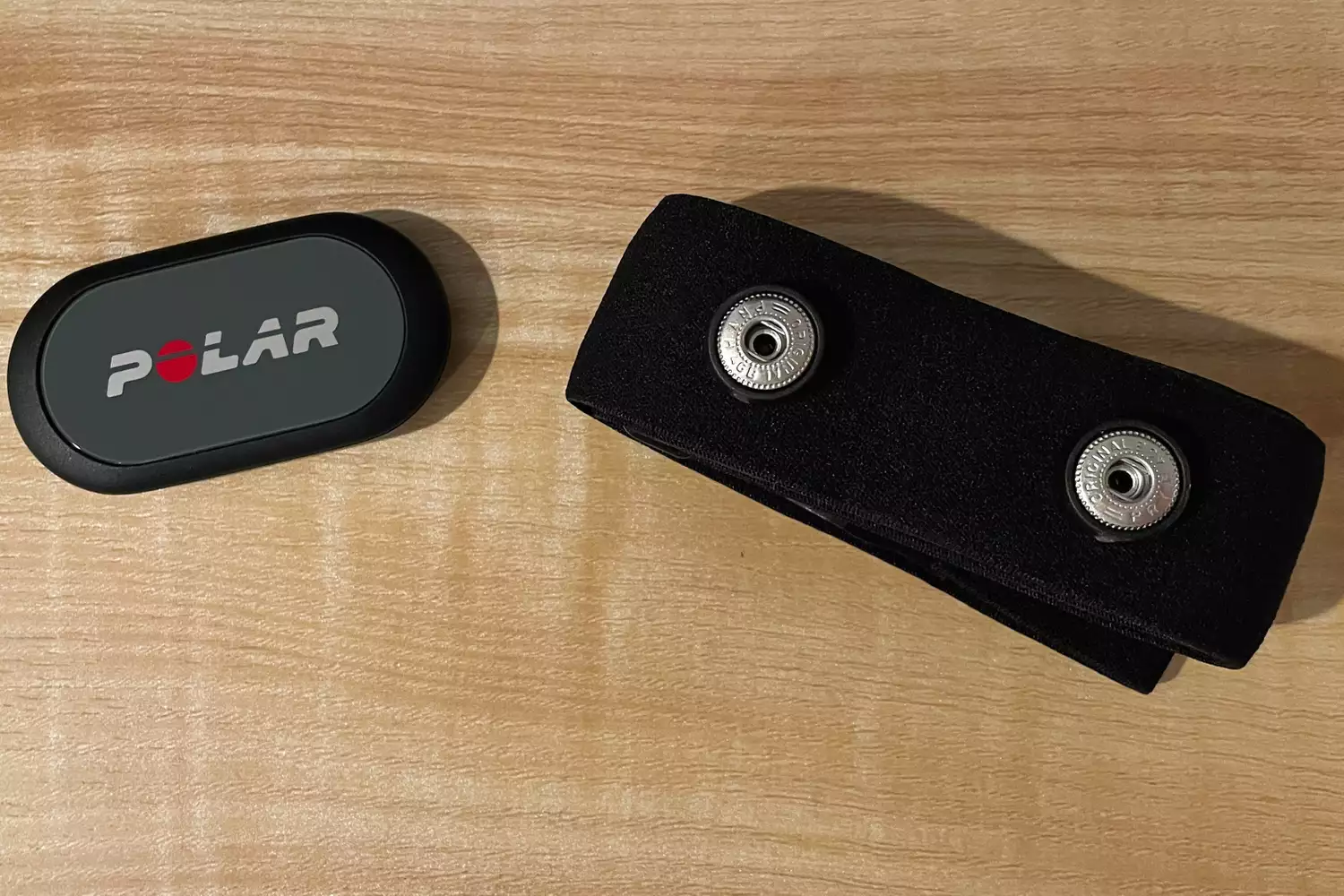 A Polar H9 Heart Rate Sensor on a table