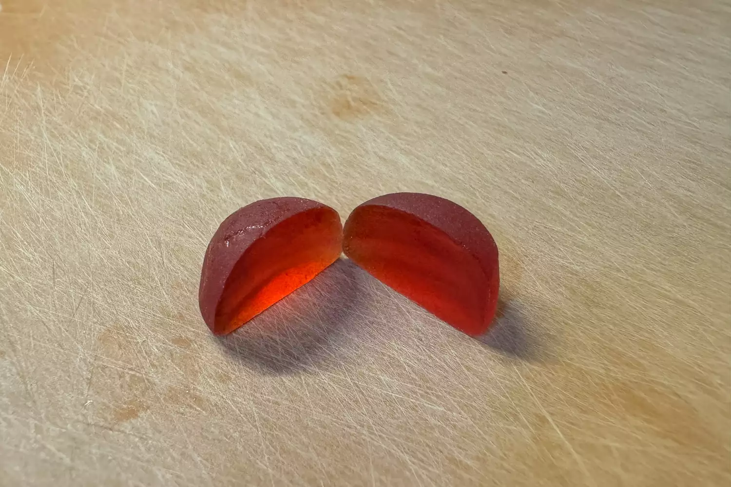 A Honey Stinger Organic Energy Chew cut in half