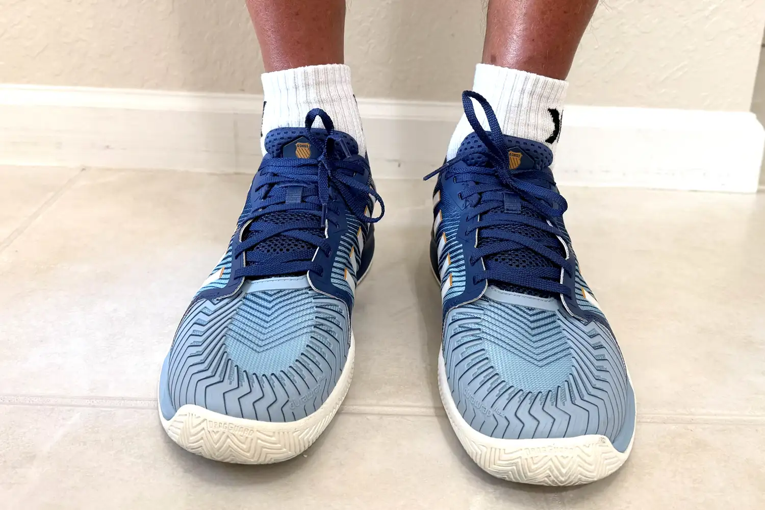 A front view of a person wearing the K-Swiss Men's Pickleball Supreme Shoes