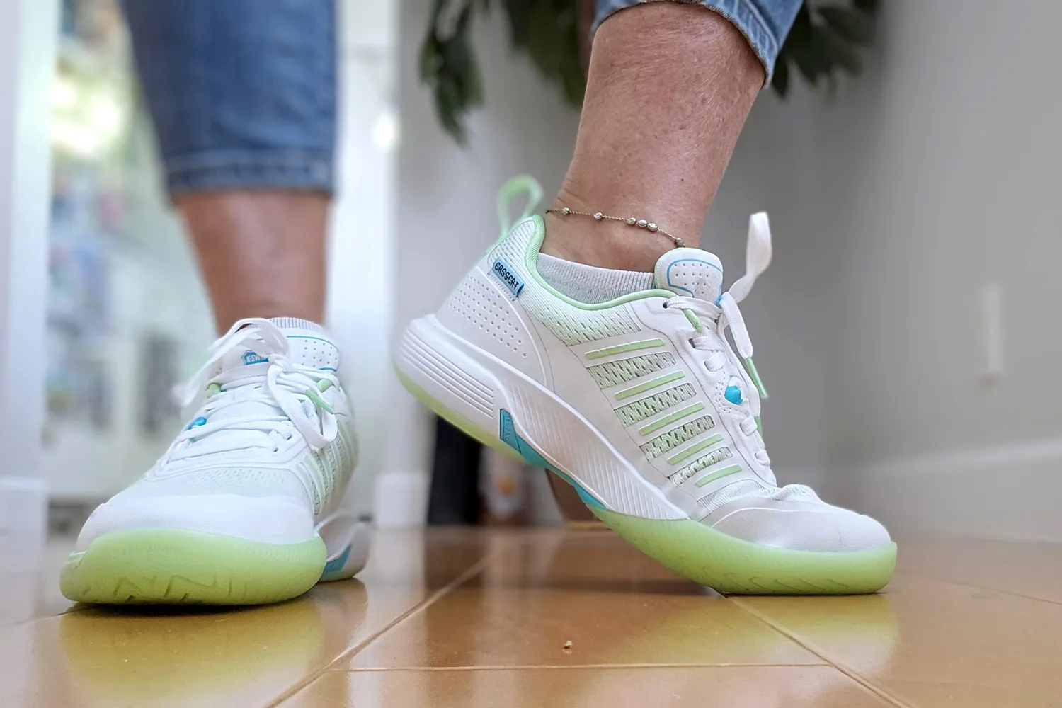 A side view of a person wearing the K-Swiss Women's Ultra Court Pickleball Shoes