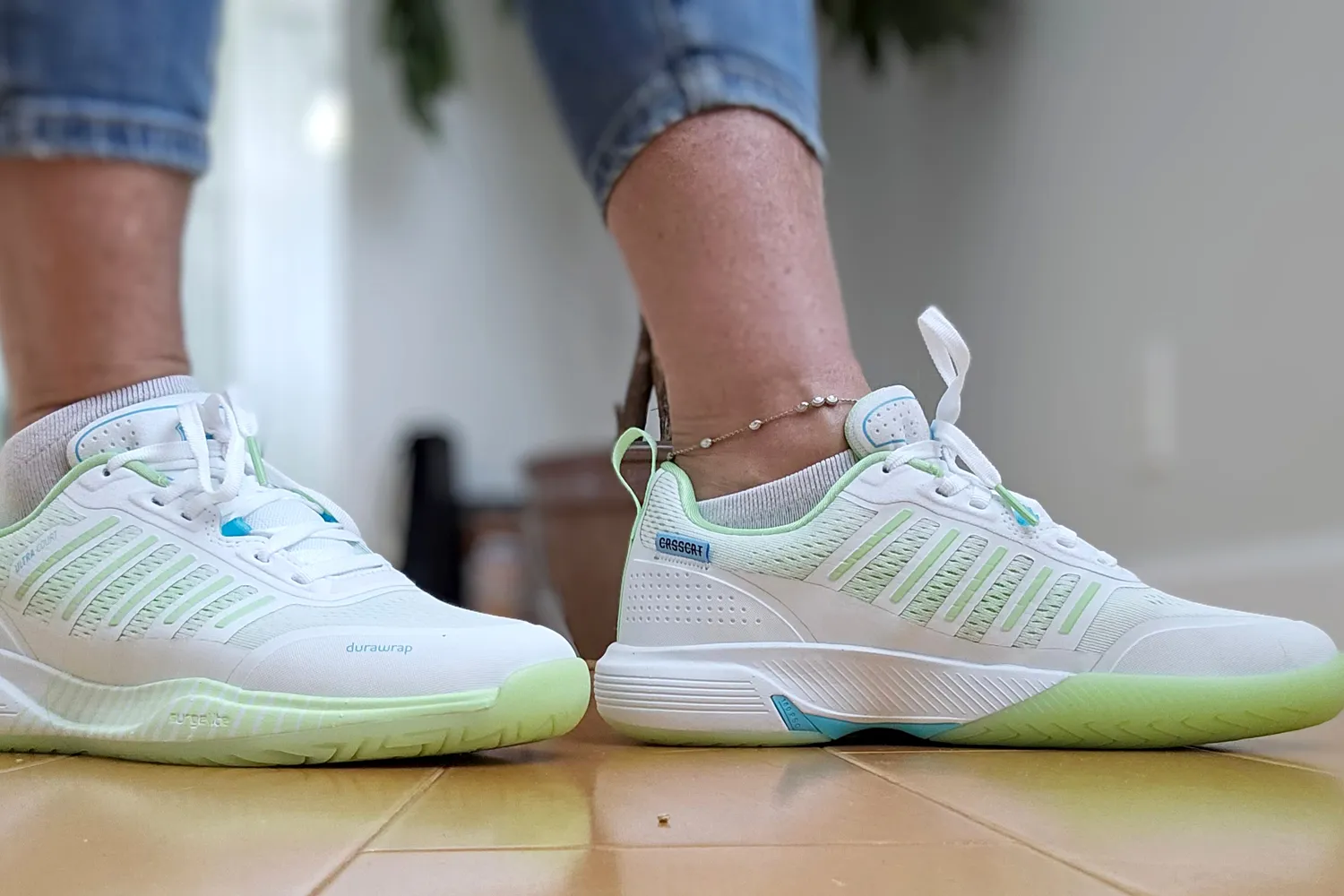 A side view of a person wearing the K-Swiss Women's Ultra Court Pickleball Shoes