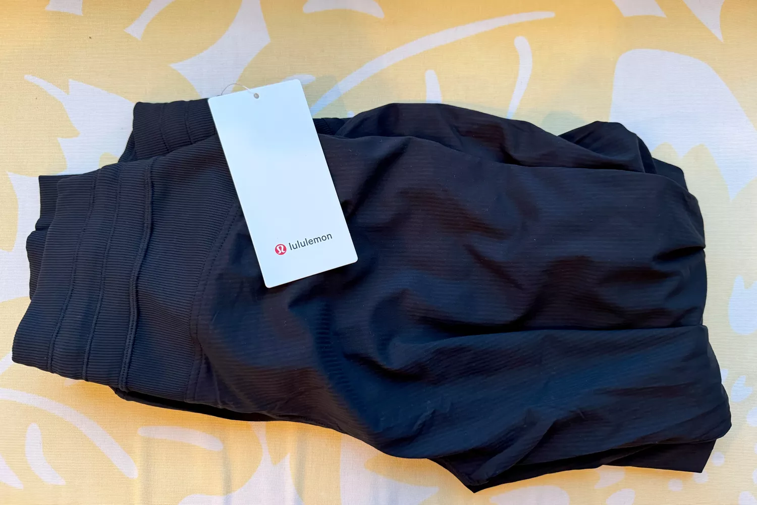 lululemon Dance Studio Mid-Rise Jogger Full Length folded on ground