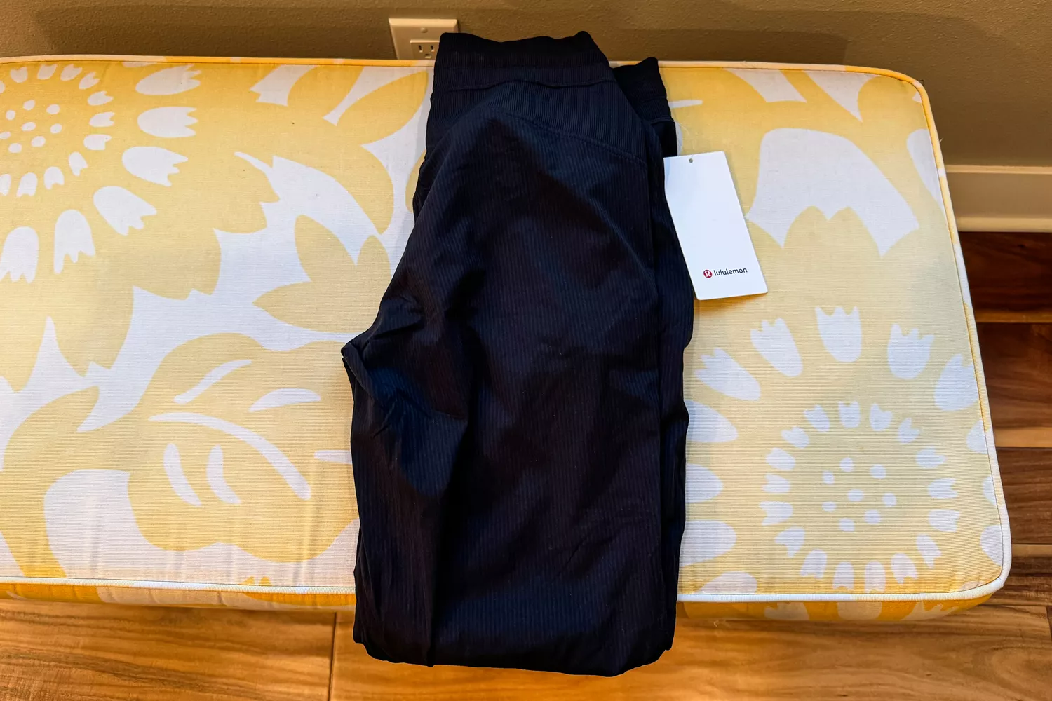 lululemon Dance Studio Mid-Rise Jogger Full Length folded on bench