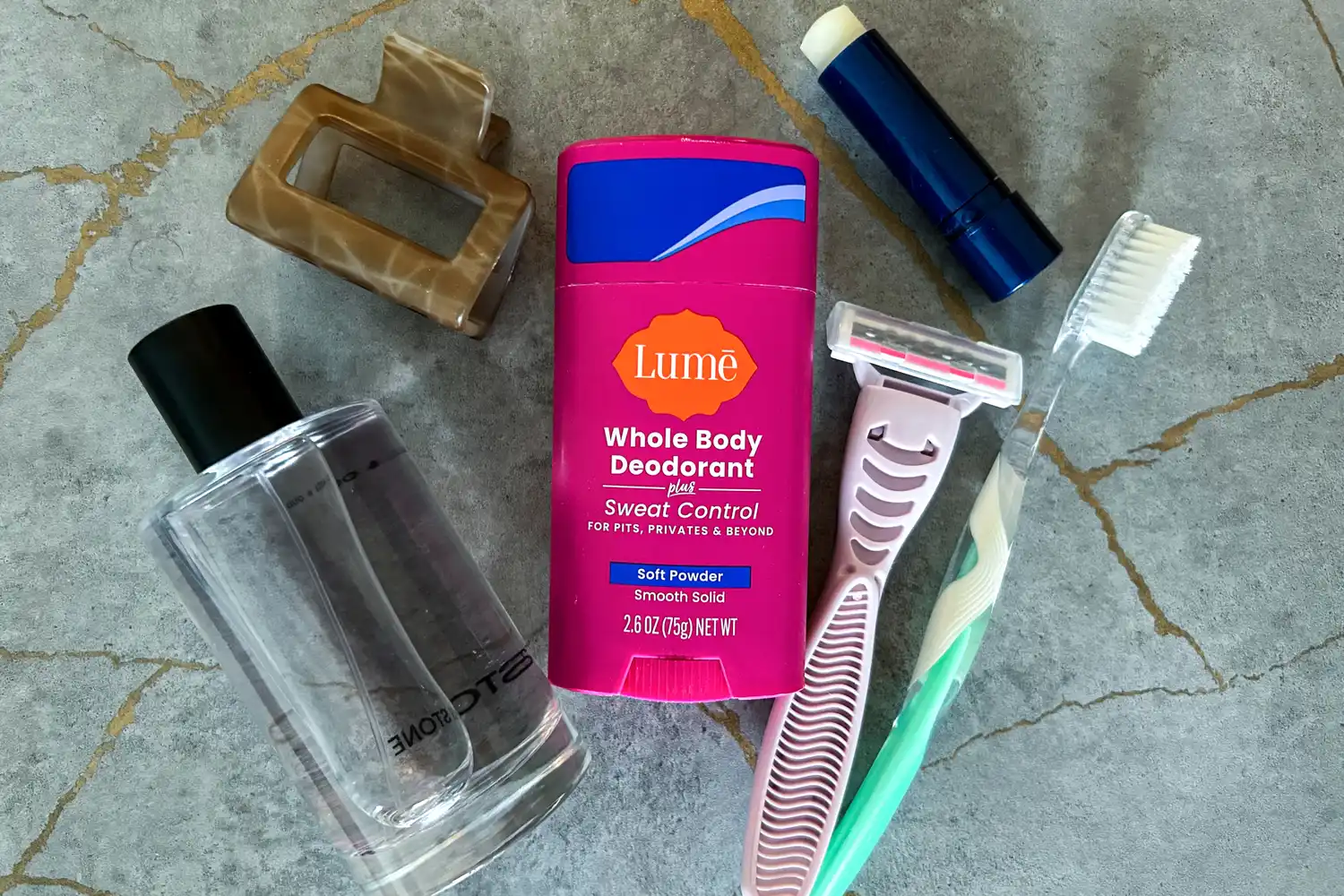 The Lume Solid Stick Deodorant Plus Sweat Control with other toiletries