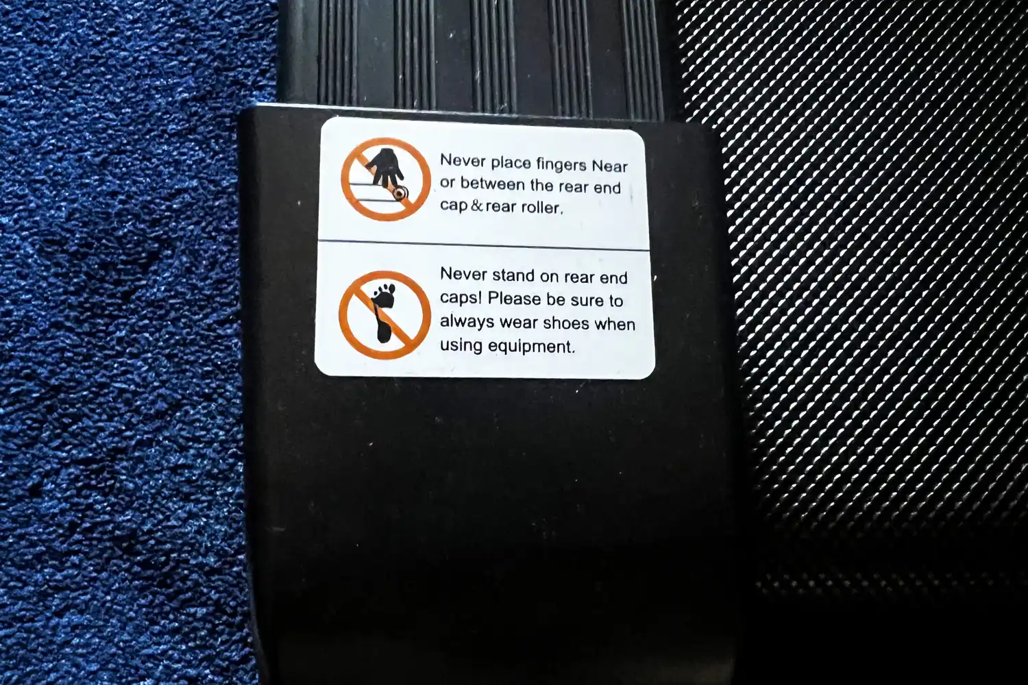 Warning stickers on the Merach NovaWalk W50 TrekPad with Incline