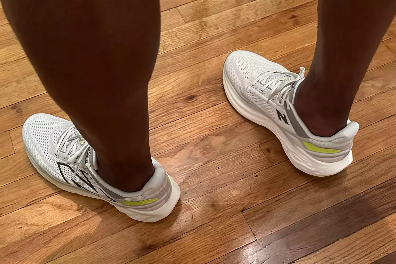 Person standing wearing New Balance Men's Fresh Foam X 1080v13