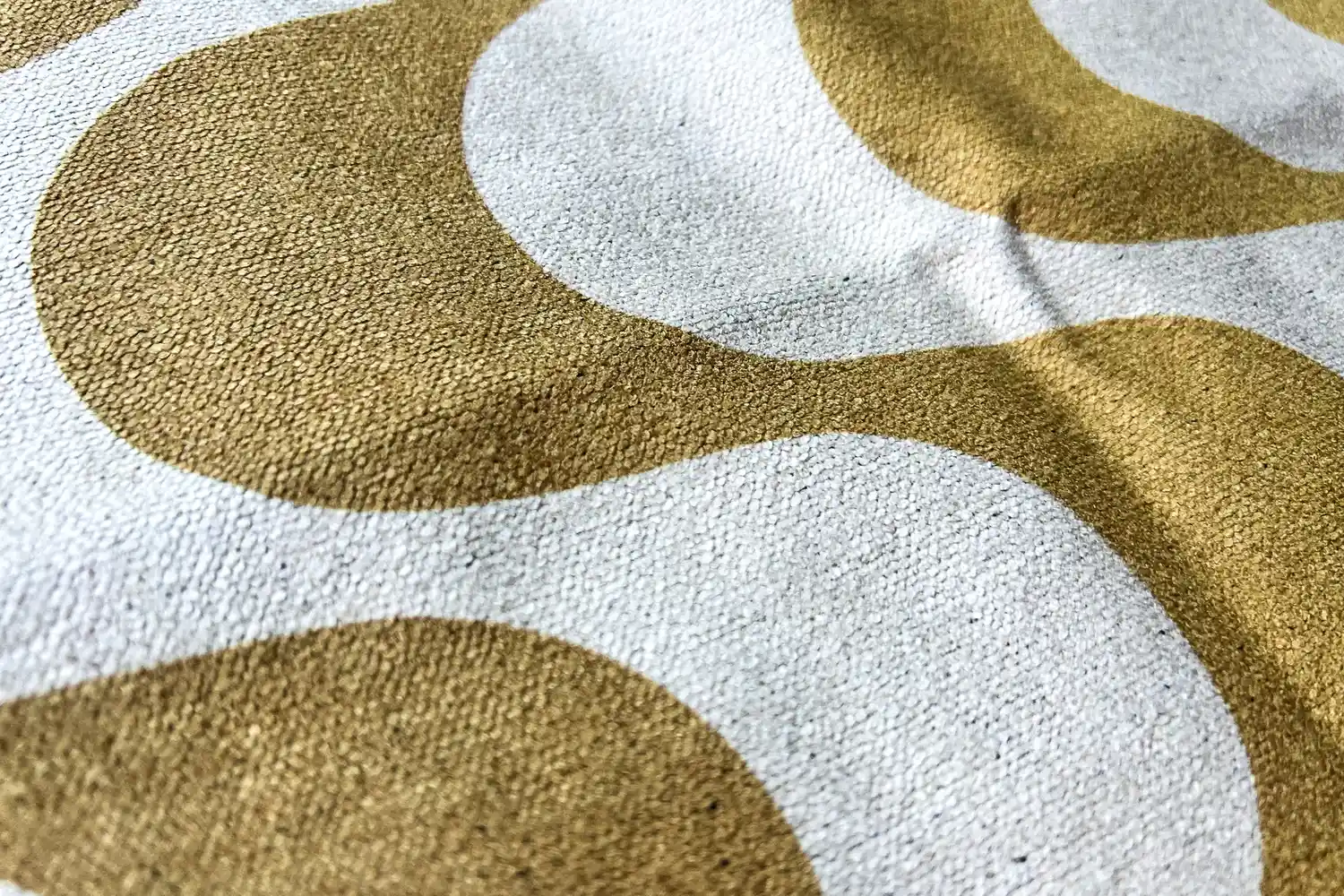 A close-up of the pattern on the Nomadix Fitness Towel