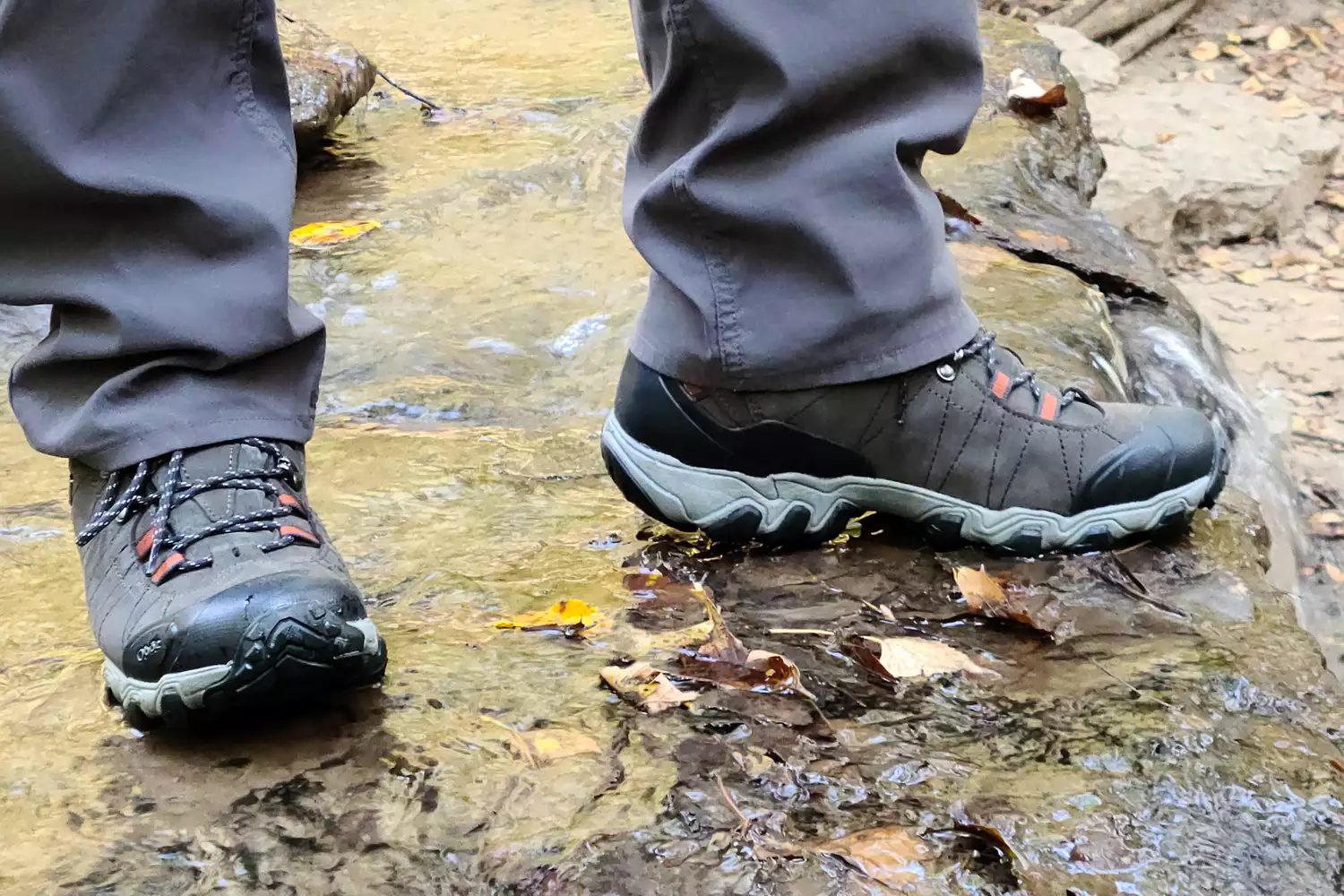 Feet standing in shallow creek wearing Oboz Bridger 9 Inch Insulated Waterproof Hiking Boot