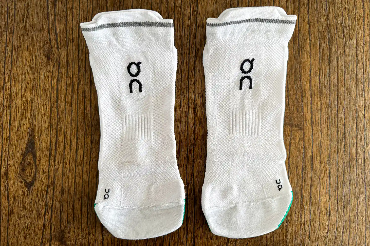 An overhead view of a pair of On Running Elite Run Low Socks