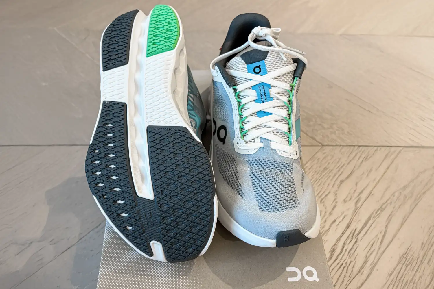 The laces and the treads on the On Running Women's Cloudsurfer Next Wide Running Shoes