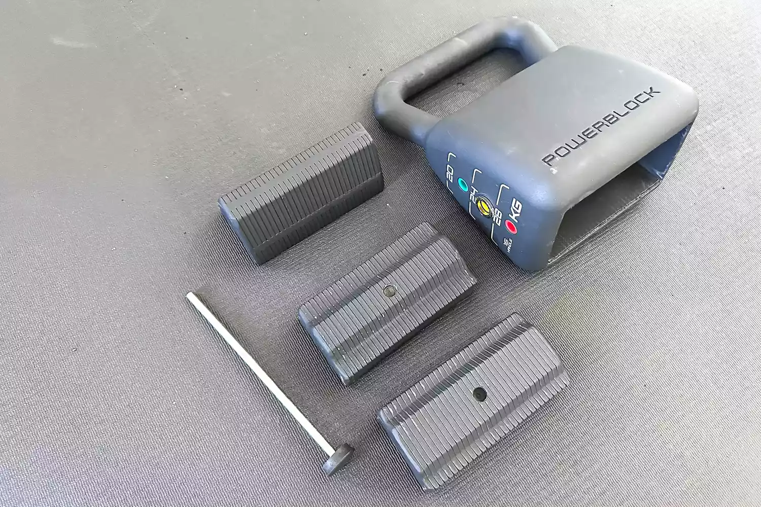 The PowerBlock Adjustable Kettlebell Weight Set before assembly