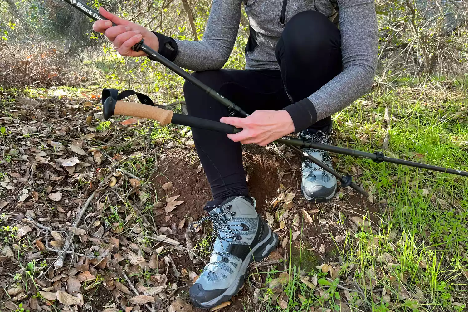 Person holding Black Diamond Alpine Carbon Trekking Poles