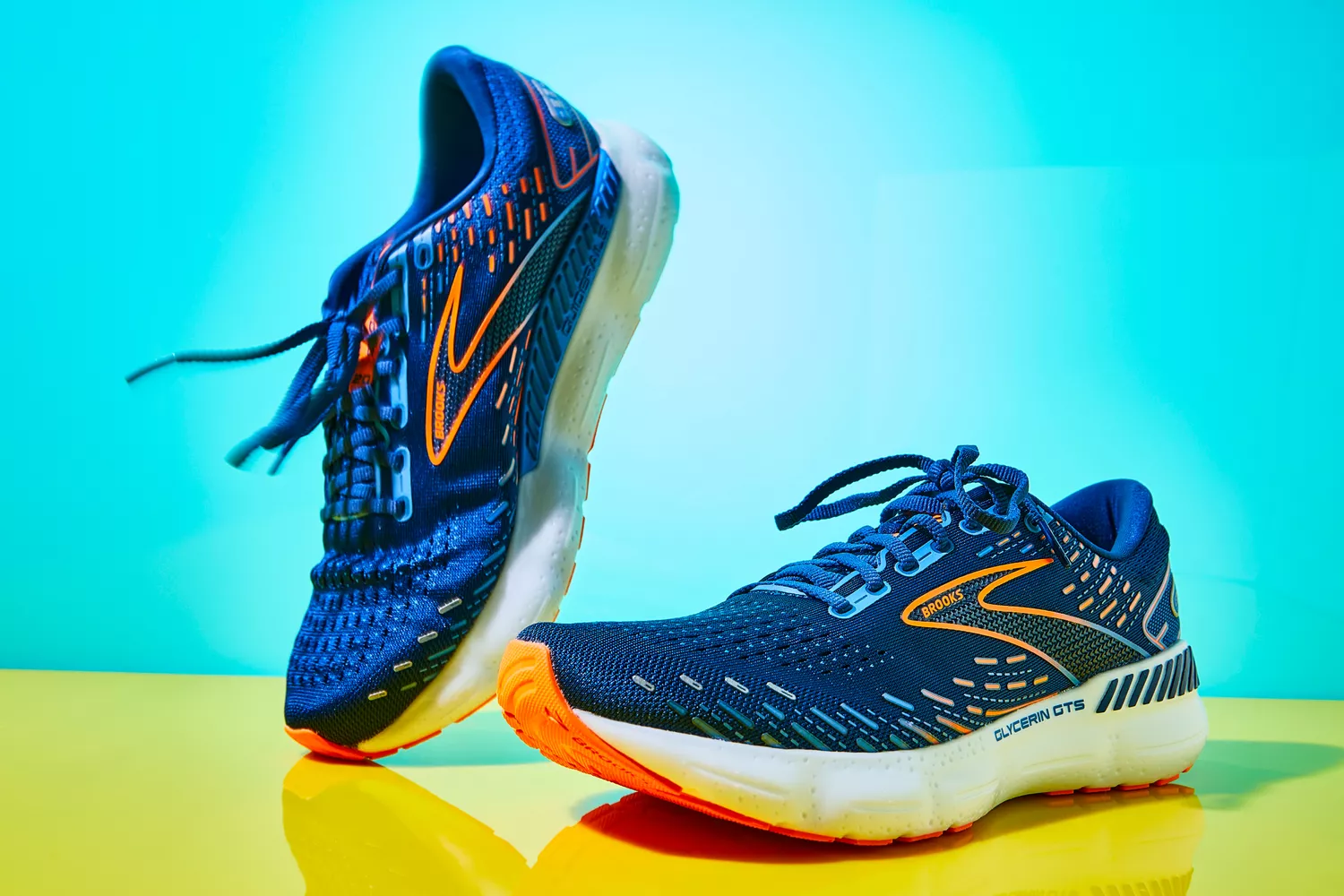 Brooks Men's Glycerin GTS 20 Running Shoes displayed on yellow and teal backdrop