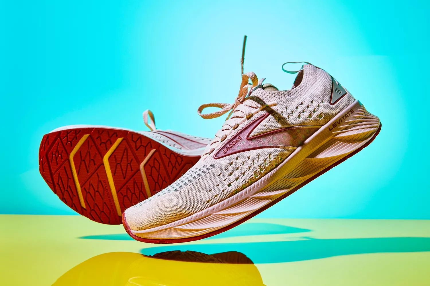 Brooks Levitate 6 on a shiny yellow surface