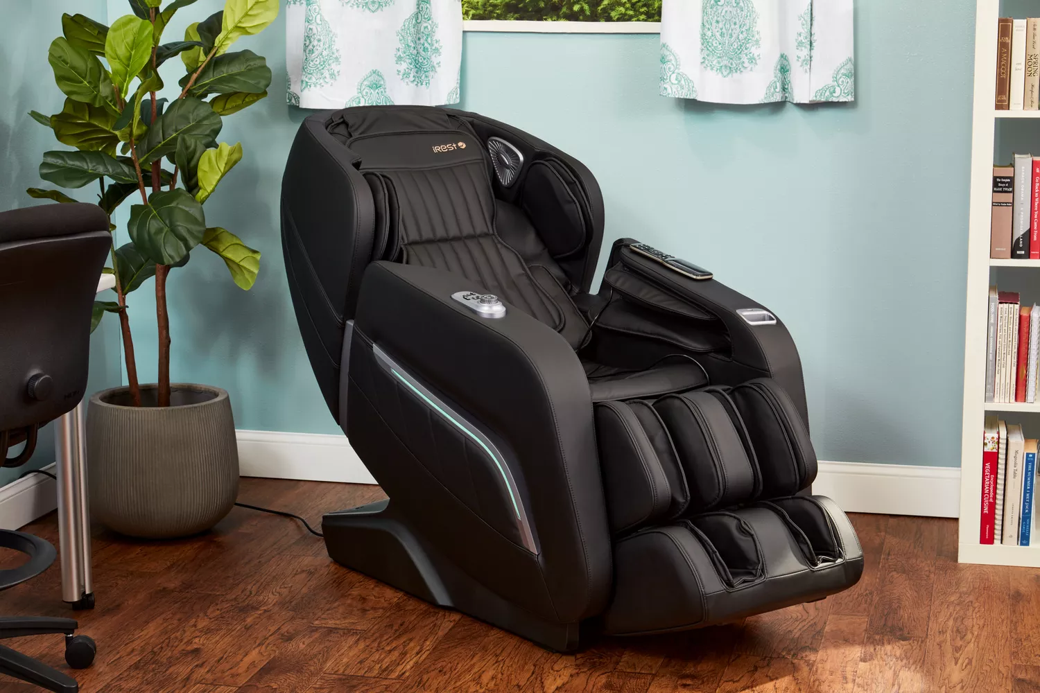 A iRest Zero Gravity Massage Chair in a blue room