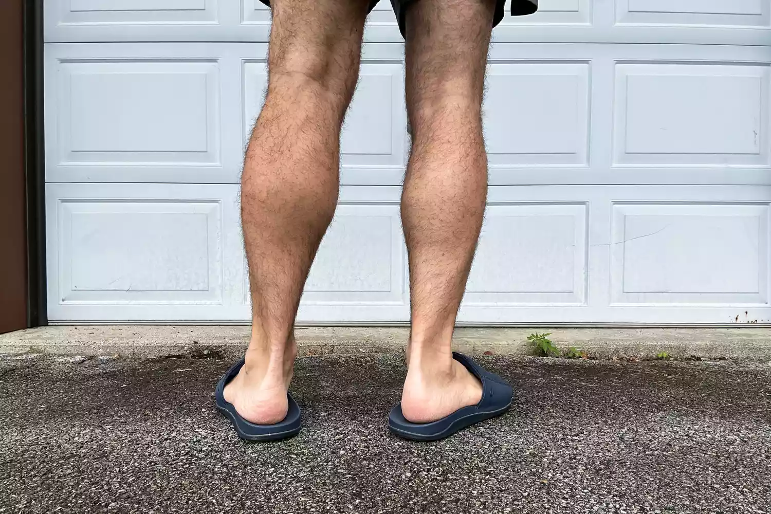 The back of the OluKai MahaâOlu Menâs Slide Sandals