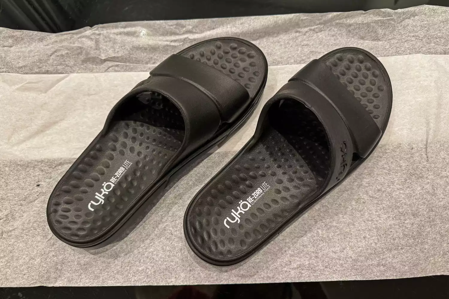An overhead view of a pair of Ryka Women's Restore Recovery Slides