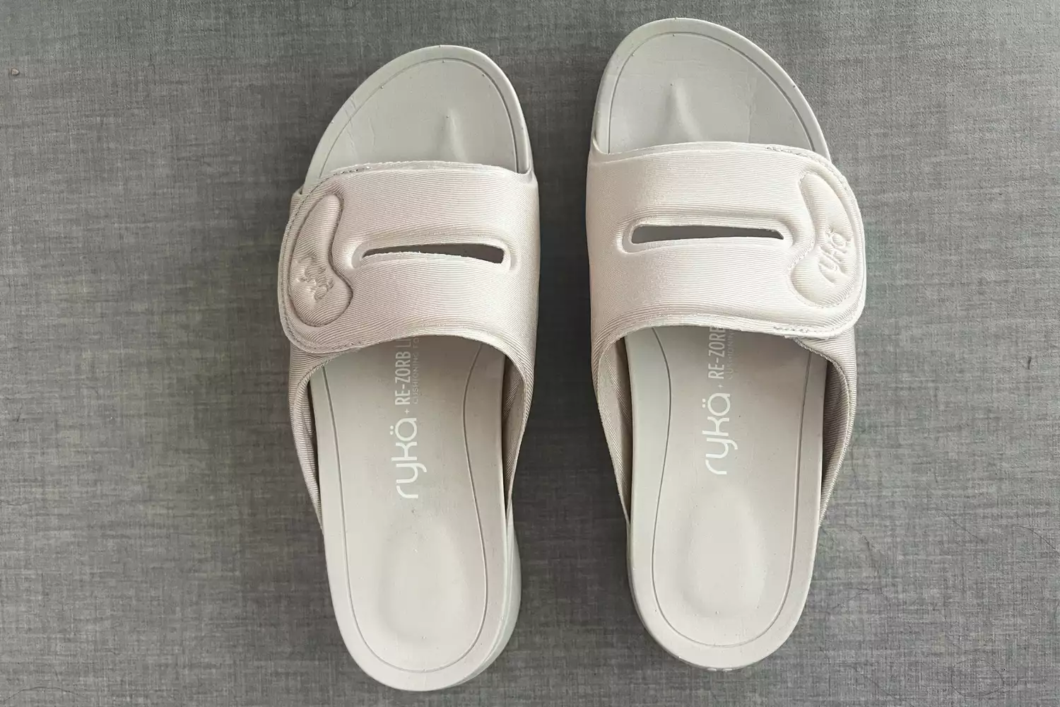 An overhead view of a pair of Ryka Women's Tao Recovery Slide Sandals