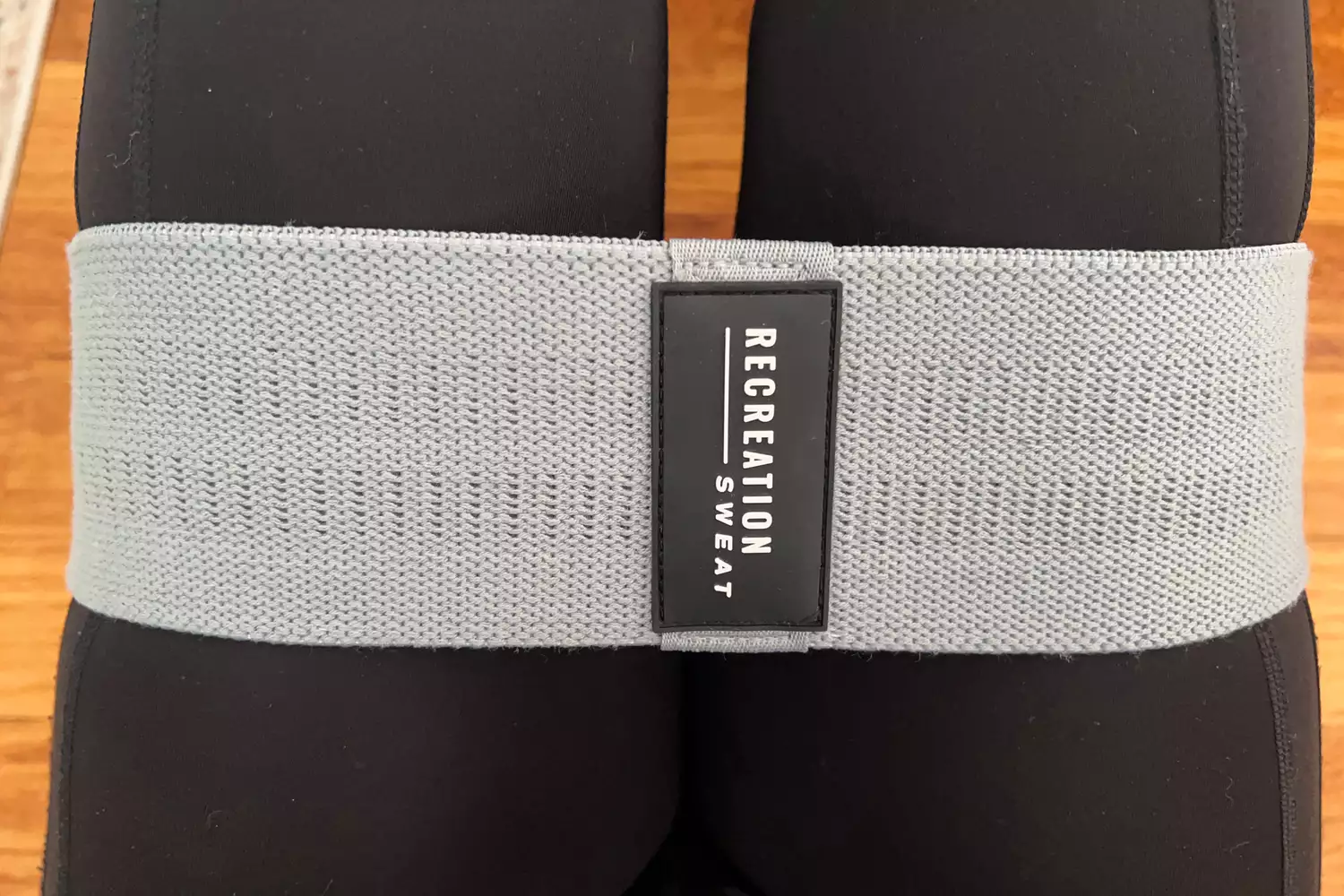 A close-up of the Recreation Sweat Resistance Band 2.0 around a person's thighs