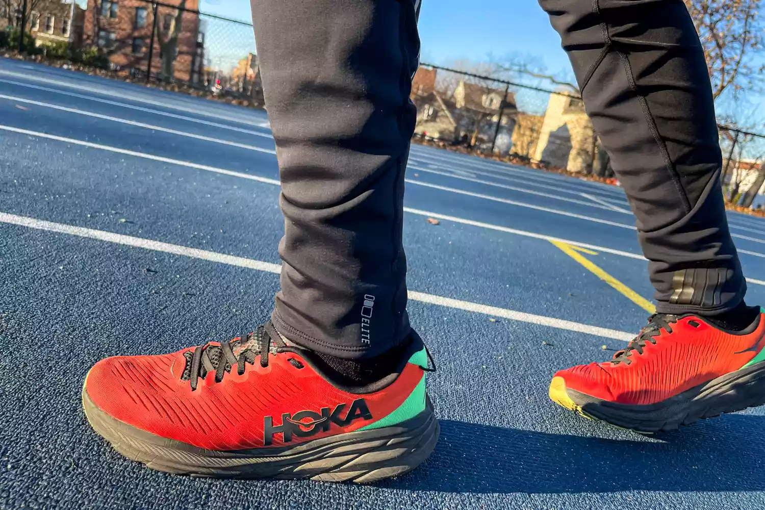 A person wears the Remind Insoles REMEDY IMPACT 5.5MM Custom Arch Heat Moldable Insoles inside sneakers